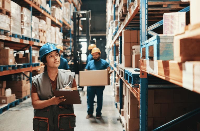 Warehouse workers take inventory